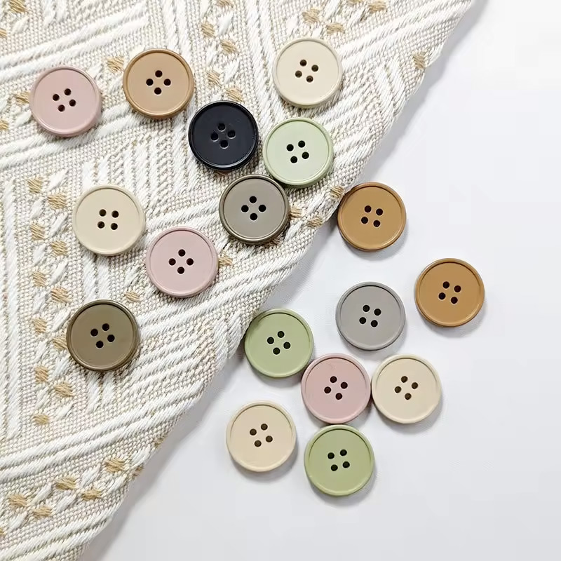 Round plastic button for sewing - various colors